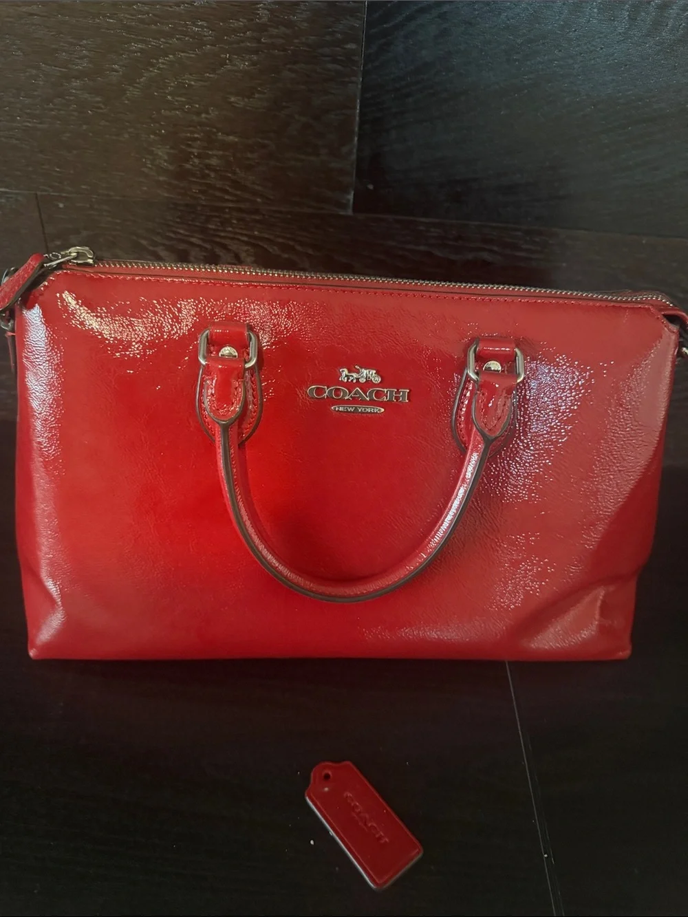 Coach glossy red